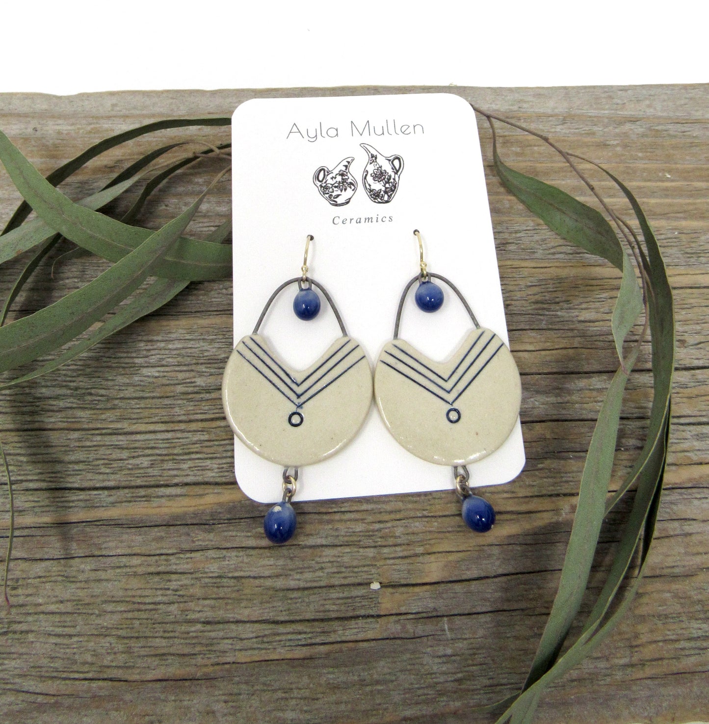 Geometric Cutout Earrings with Small Dangles