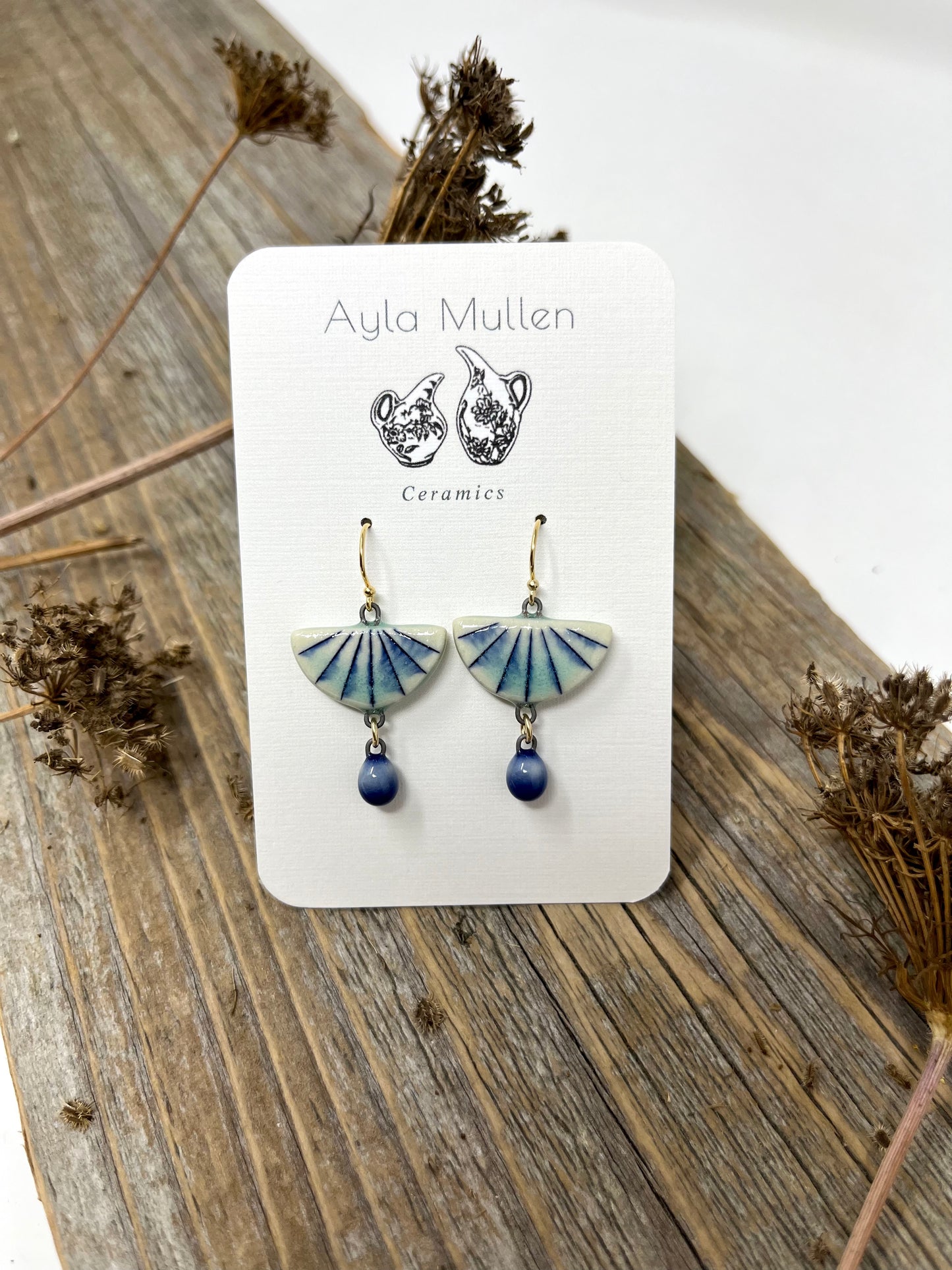 Striped Half-Circle Earrings with Blue Dangles