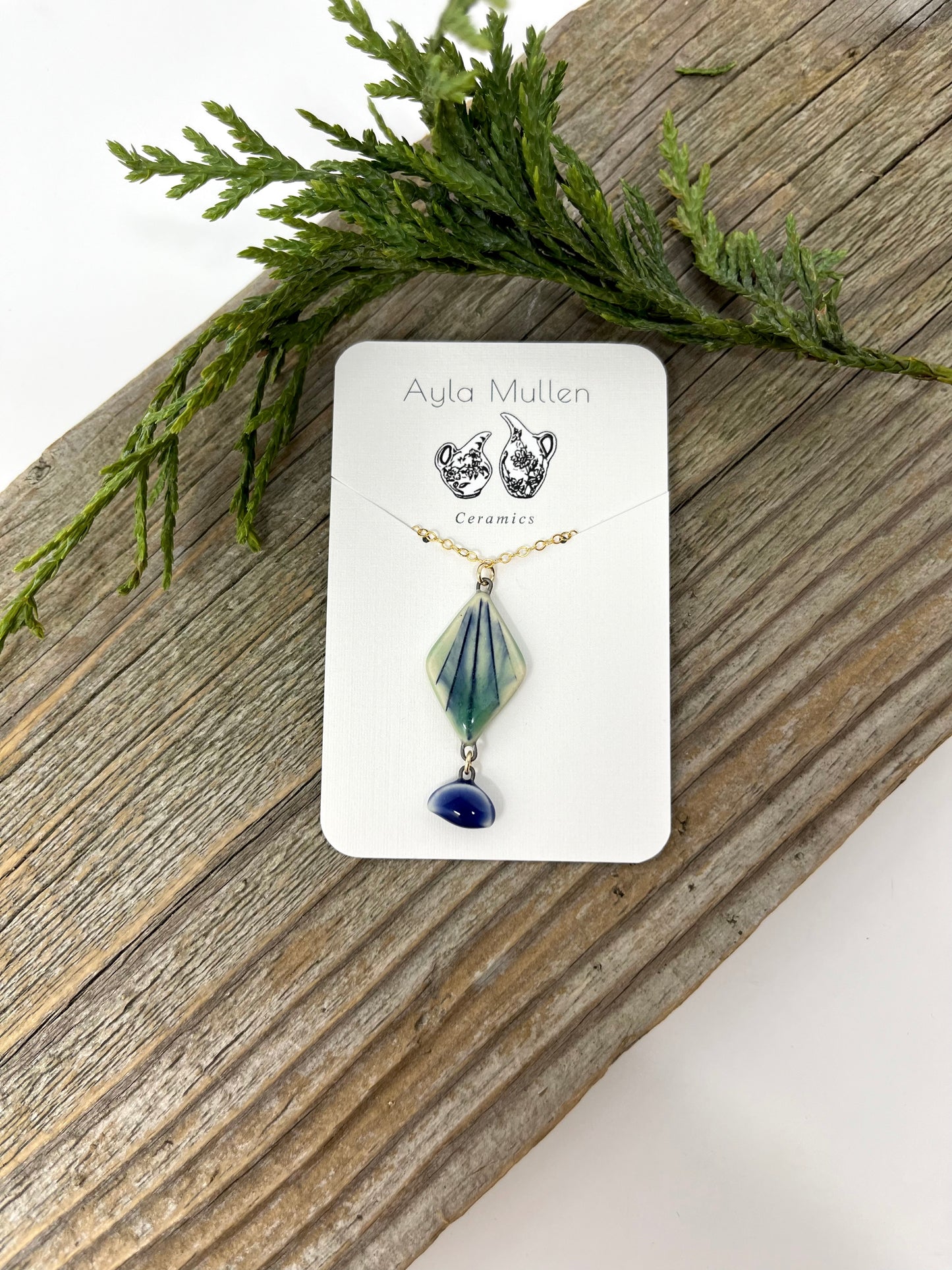 Diamond Pendant with Cobalt Drop