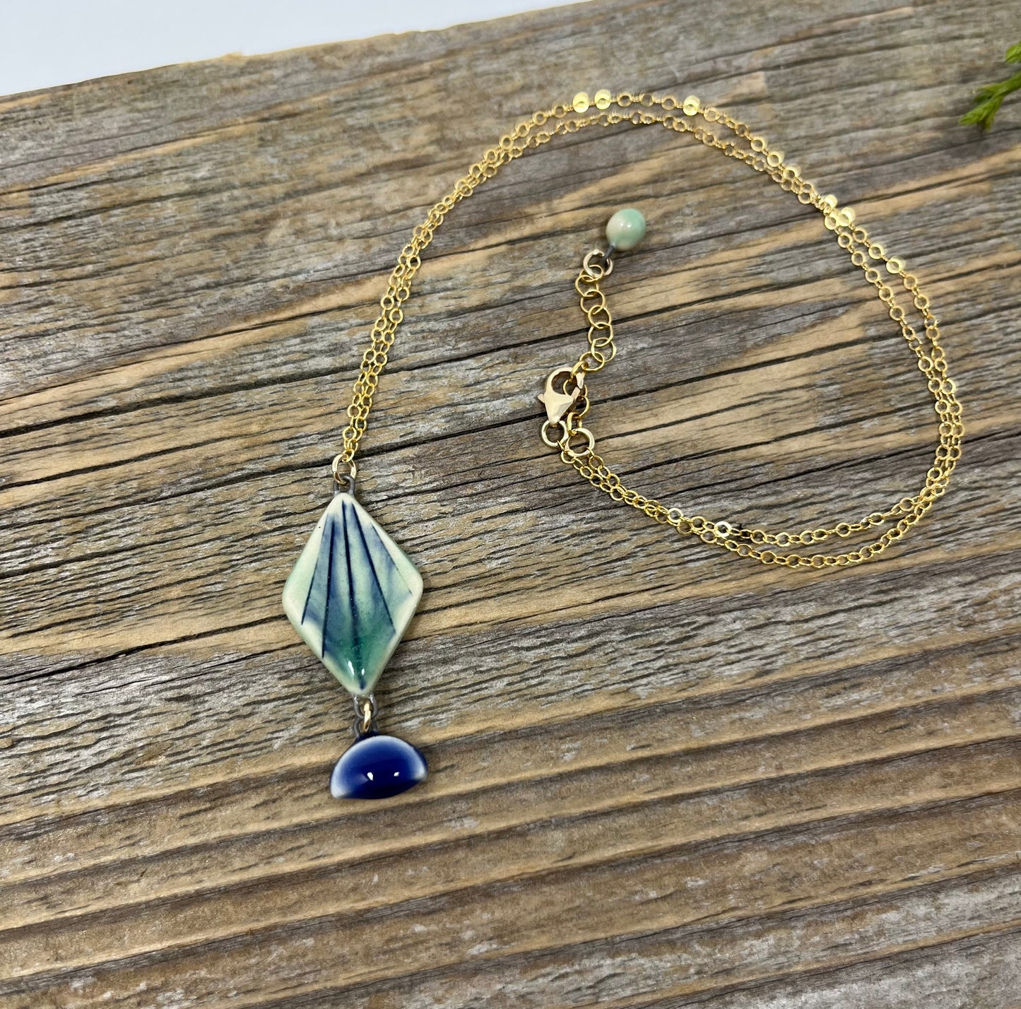 Diamond Pendant with Cobalt Drop