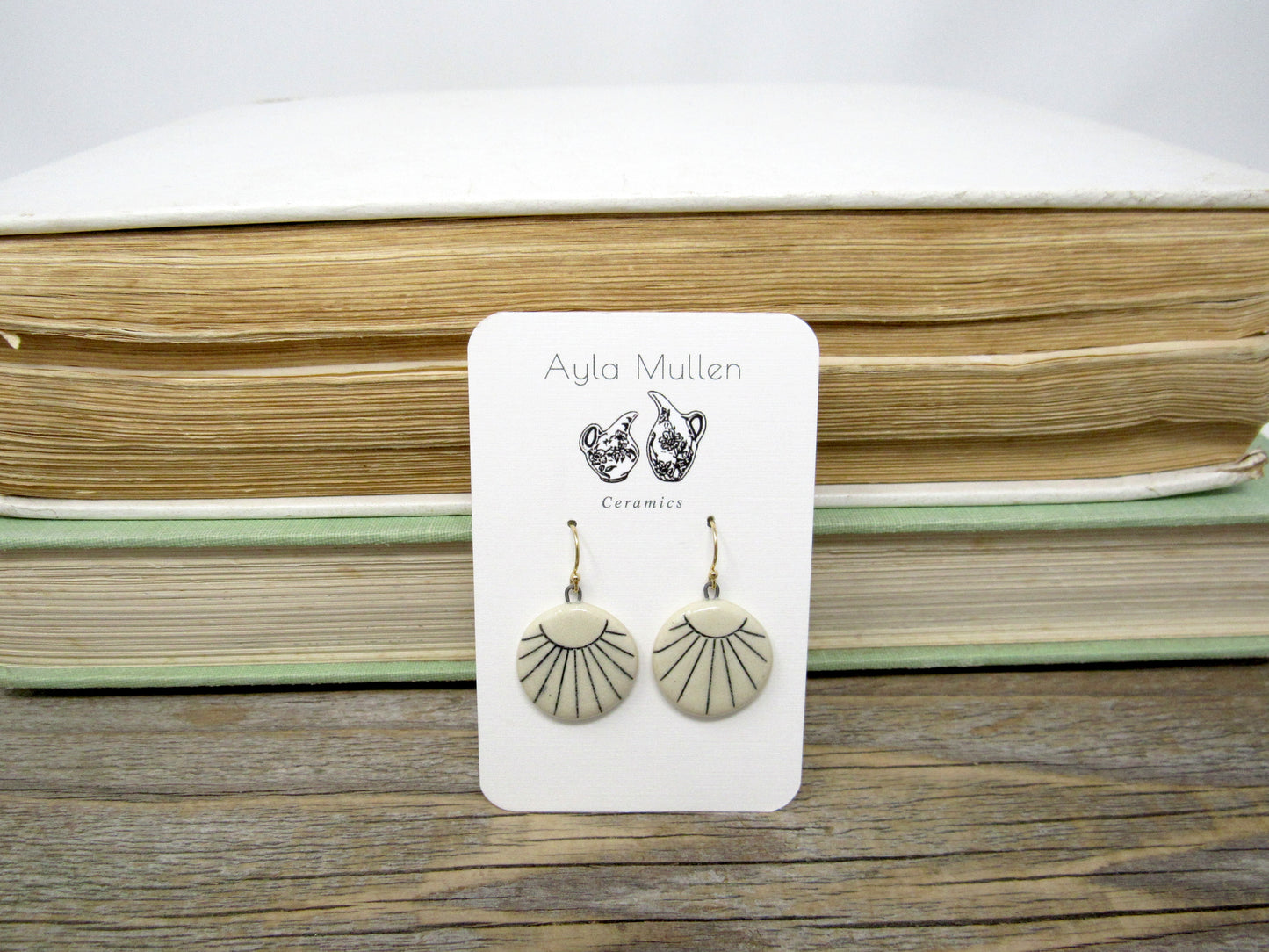 Small Round Sunburst Earrings in Black