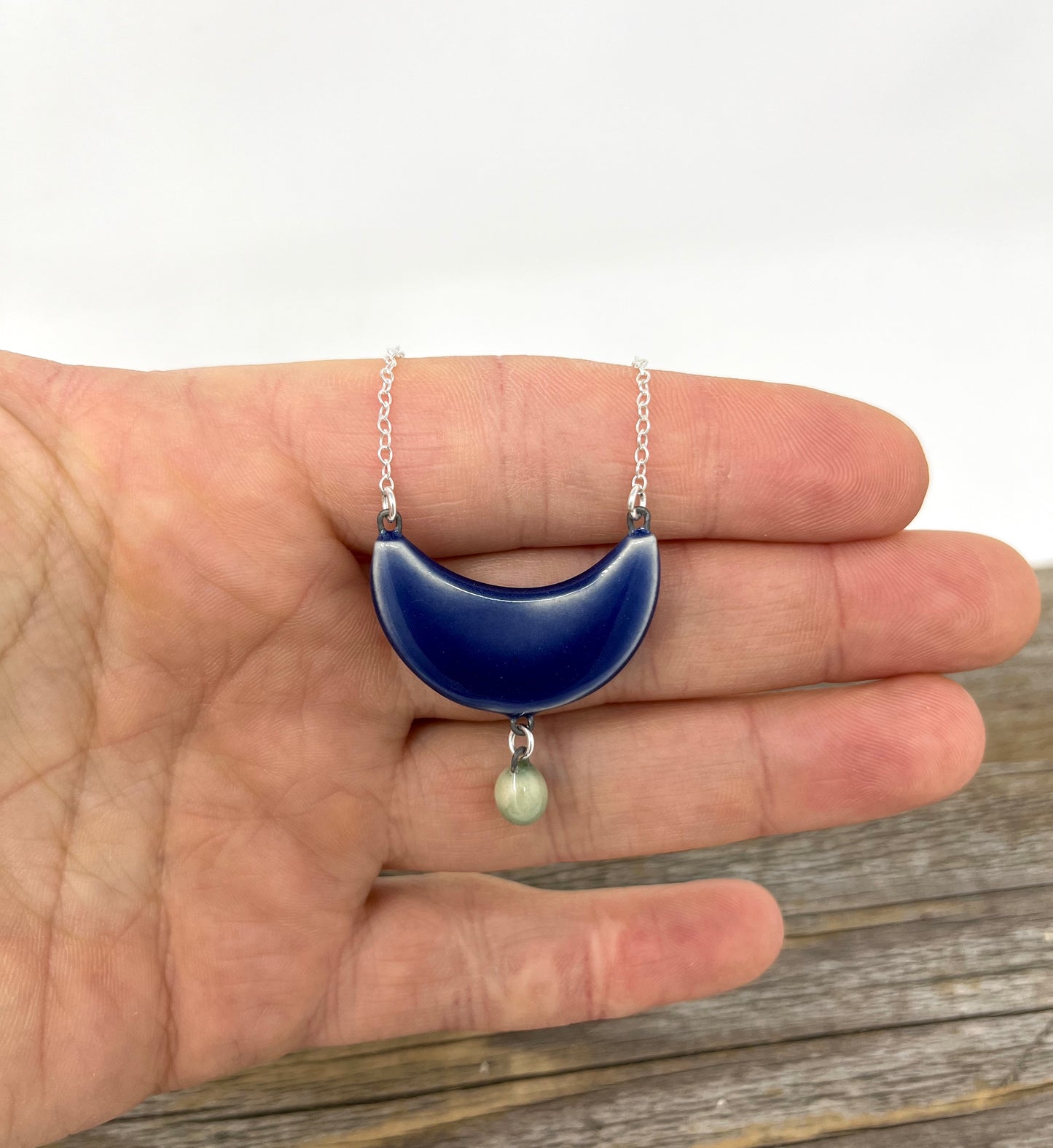 Cobalt Arch Necklace with green drop, on Sterling Silver