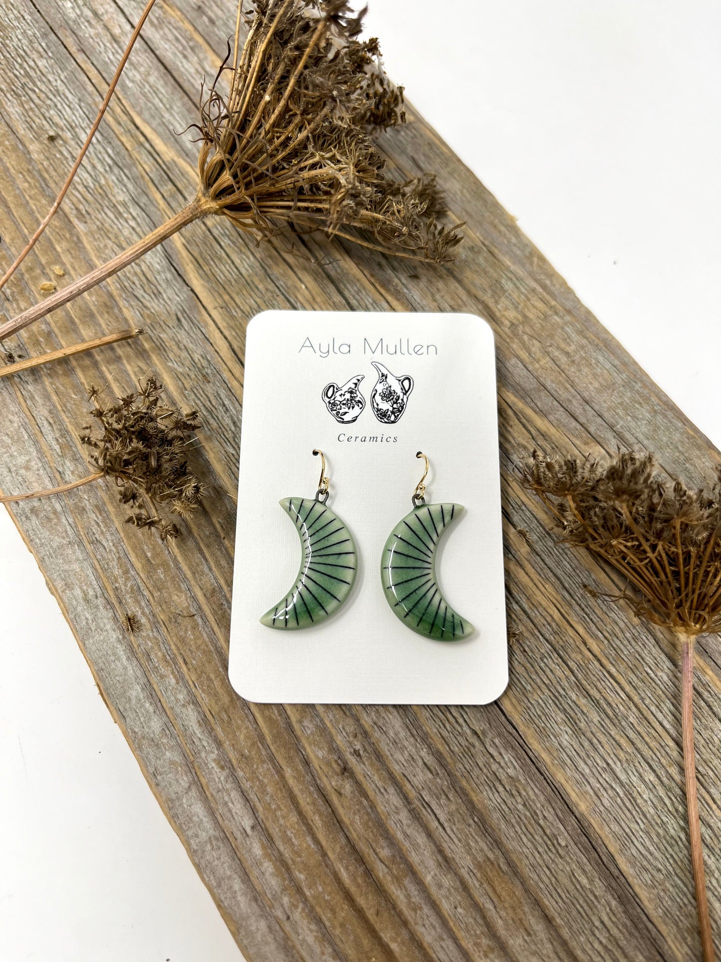 Striped Crescent Moon Earrings in Black and Green