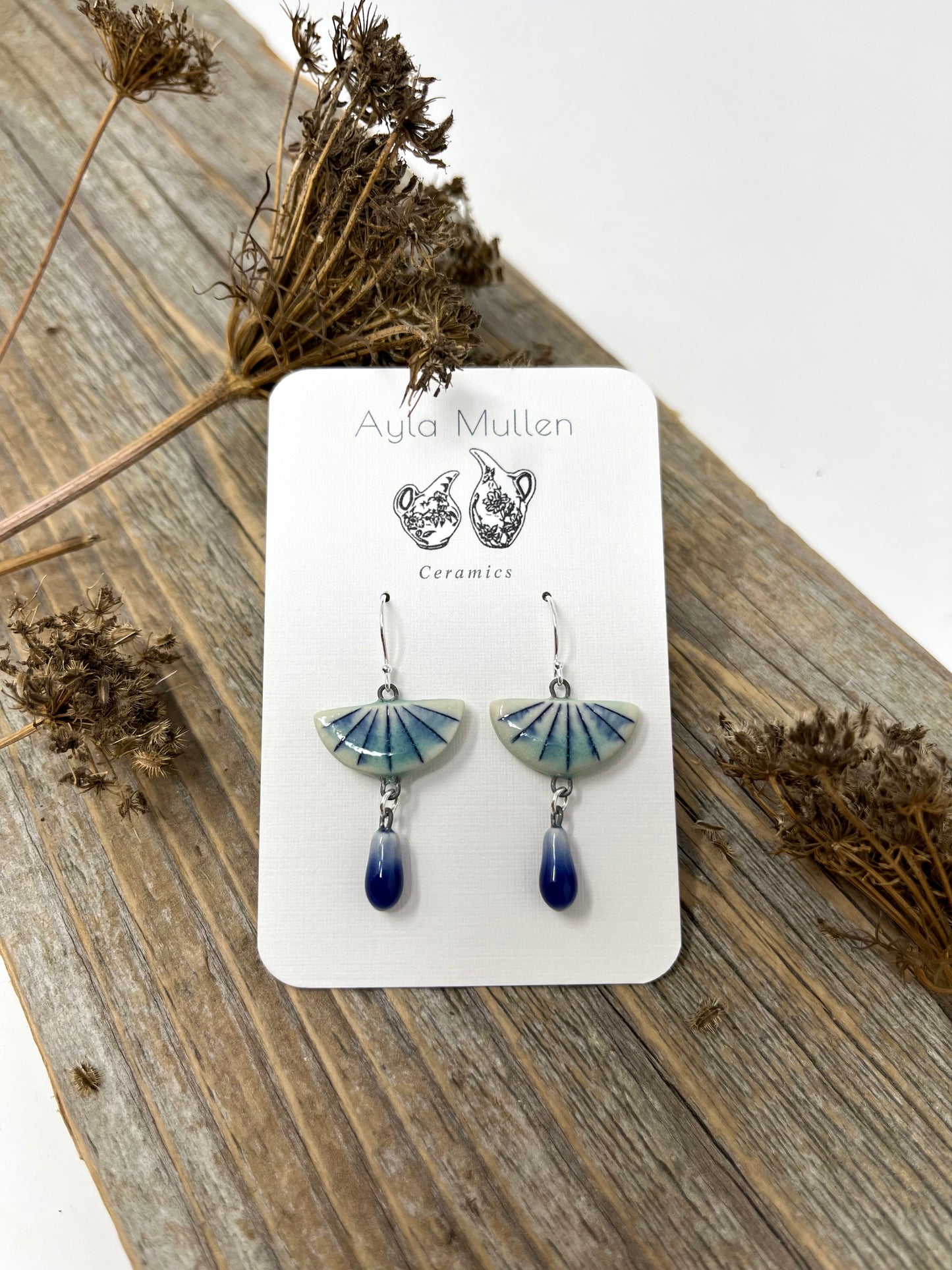 Striped Half-Circle Earrings with Blue Dangles