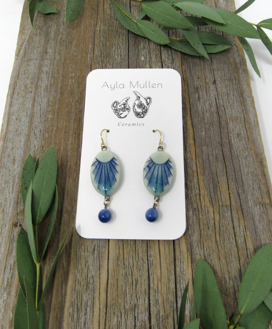 Small Oval Sunburst Earrings with Blue Dangles