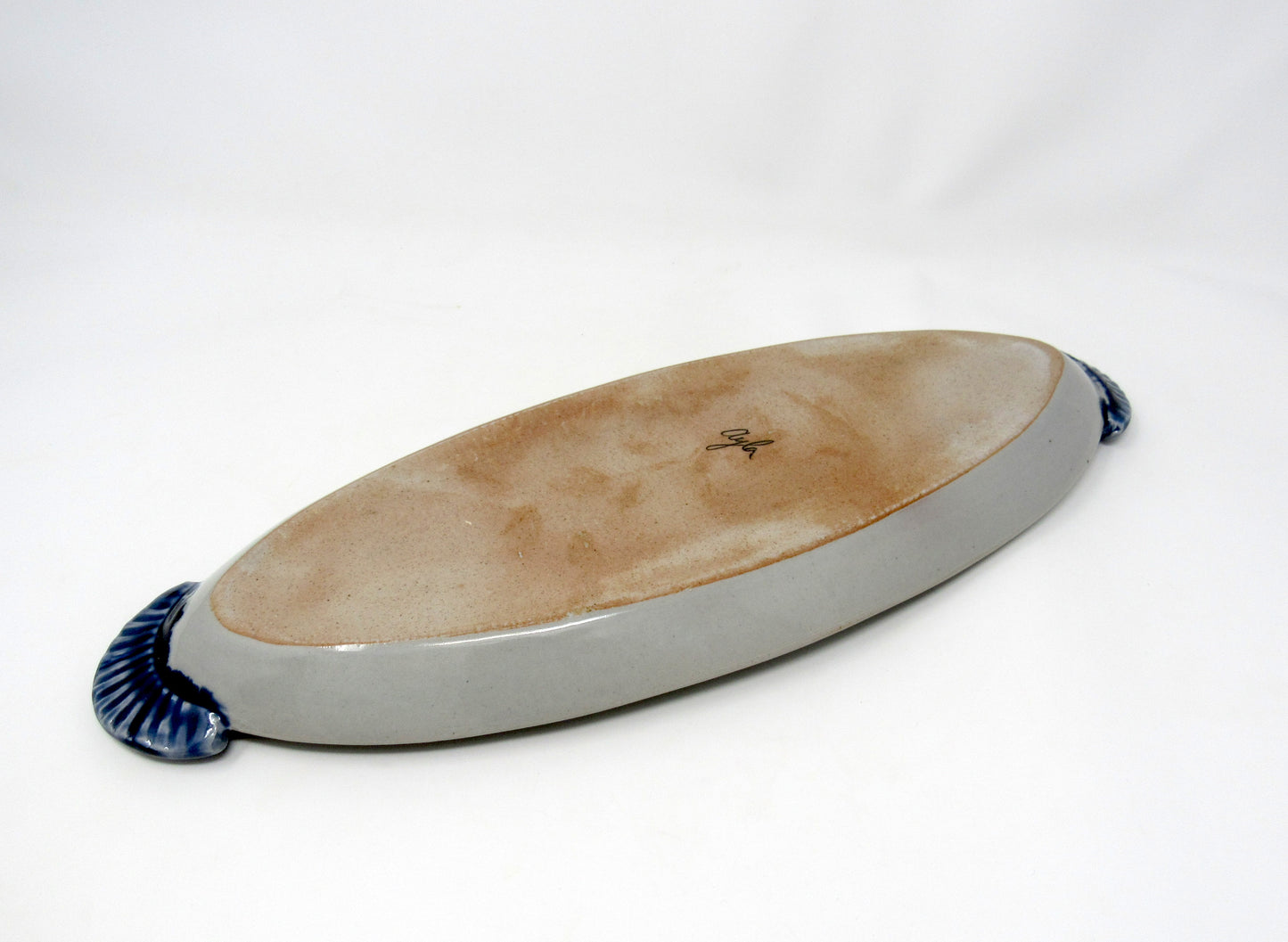 Oval Chickadee in the Grass Tray